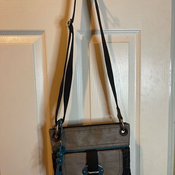 - Fossil Key-Per black quilted fabric ,gray trim and teal accents. Crossbo… - Picture 8 of 13